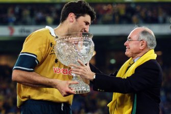 Former Wallabies captain John Eales with former prime minister John Howard (right). The Coalition held the key seat of Aston on the same day Mr Howard was on hand to see the Wallabies defeat the British and Irish Lions.
