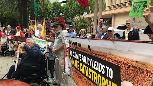 Anti-climate change protesters outside COAG on Friday. 