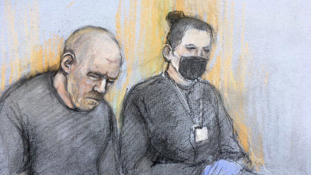 This court artist sketch shows serving police constable Wayne Couzens, left, appearing in the dock at Westminster Magistrates’ Court in London.