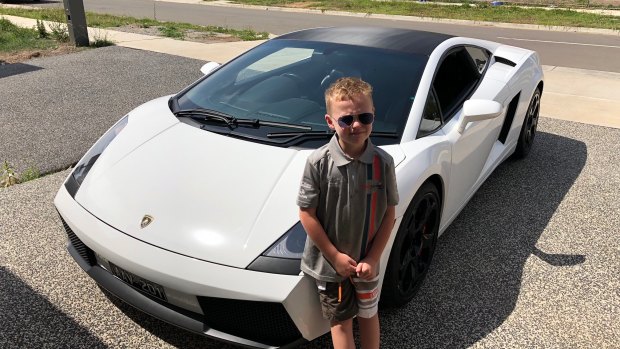 Jet Tormey with a luxury car hired by his father Michael Tormey as part of Jet's 7th birthday celebration. 