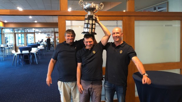 Celebration: David Giles, David Chapman and Matt Whitnall with the Sayonara Cup.