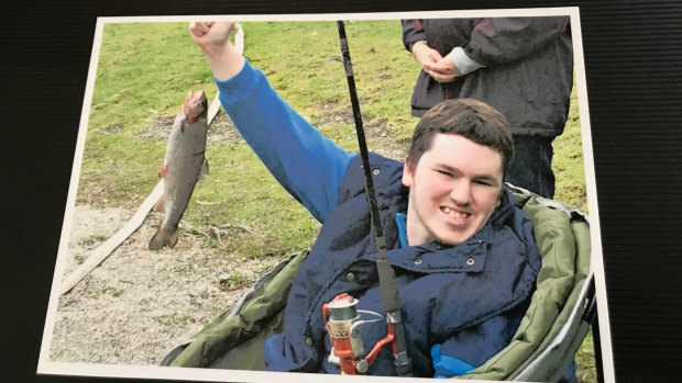 Alexander in happier days, on a fishing trip. 