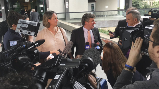 ANZ customers Dimity and Michael Hirst speak to media outside the banking royal commission on Wednesday.
