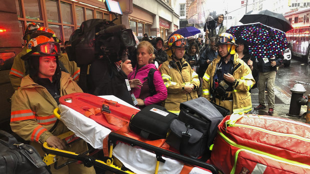 First responders arrive near the scene of the crash. 