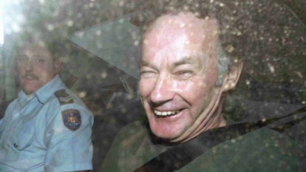 Convicted murderer Ivan Milat leaves an appeal court in a police car on November 4, 1997.