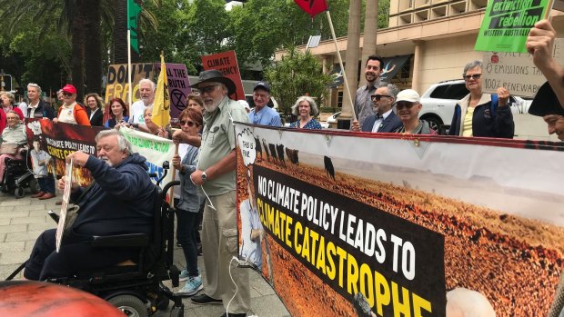 Anti-climate change protesters outside COAG on Friday. 