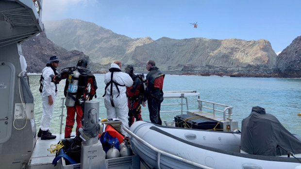 Police divers preparing to search the waters near White Island on Saturday.