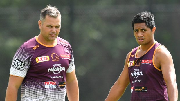Broncos coach Anthony Seibold (left) is seen with Anthony Milford (right) during Brisbane Broncos training on Wednesday.