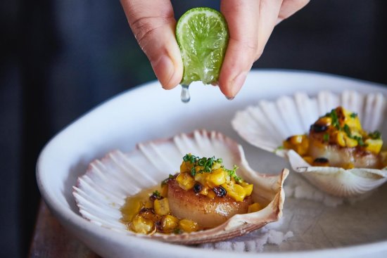 Baked scallops with miso butter and corn at The Herring Room.