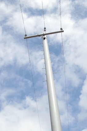 A composite power pole made of fibreglass and resin with UV coating.