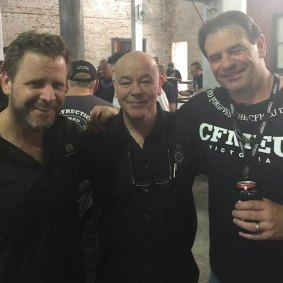 Christy Cain (centre) is close to John Setka (right).