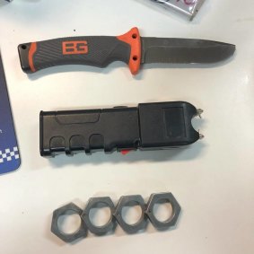 Police found knives, a taser and knuckledusters.