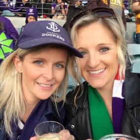 Heather McNeill (left) at a Dockers game.