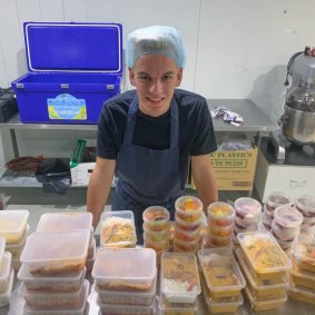 Alex Dekker with an early batch of free meals he made for health workers from his original donated kitchen space in Moorabbin last week.