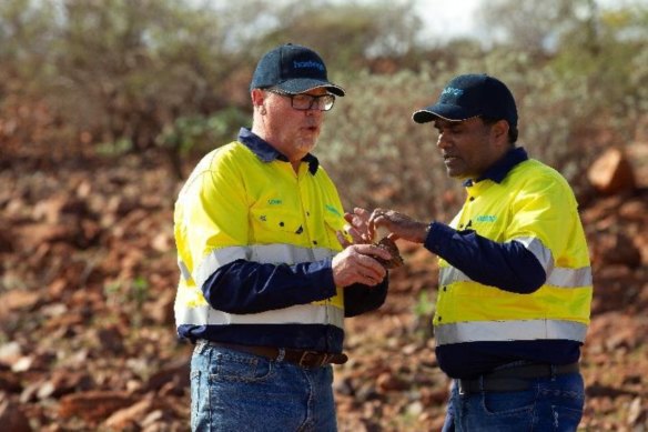 Hastings Technoloy Metals chief geologist Dr Louis Schurmann, left, with principal mining engineer Ravi Reddy on-site at Yangibana.