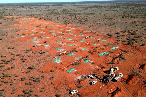 Marmota Ltd’s aerial view of drilling in progress at its Greenewood gold prospect, viewed from north to south. The program sunk 146 reverse circulation drill holes into the target area for 15,480 metres. 