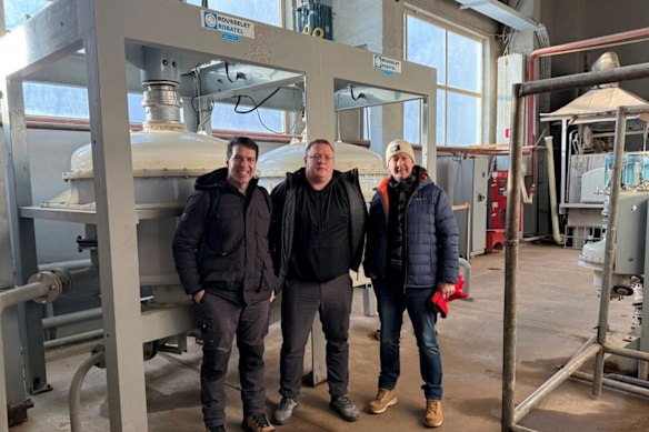 Lindian executive chairman Robert Martin and executive director Zac Komur with Vladimir Fedotov at the SARECO plant in Kazakhstan.