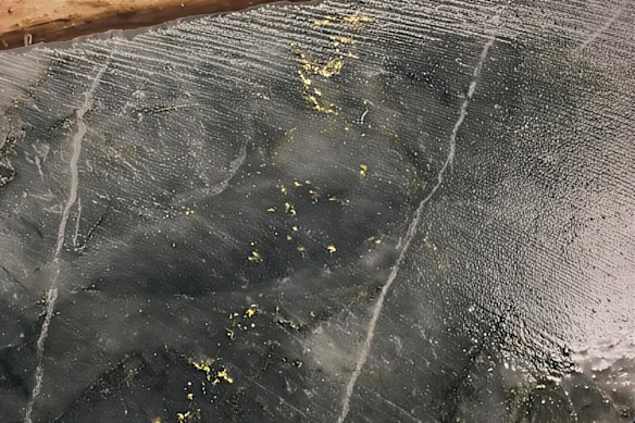 Olympio Metals’ diamond drill core from the Paquin East prospect at its Bousquet gold project in Quebec, showing visible gold at 184.5m depth, assaying 129.25g/t gold.