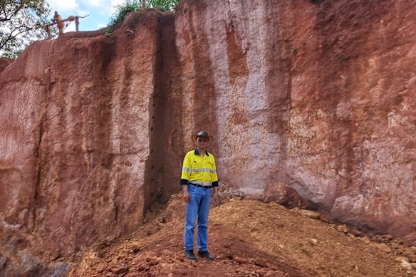 Aurum Resources managing director Dr Caigen Wang, in one of the many historic artisanal gold mining open pits in the deeply weathered oxide zone at Boundiali.