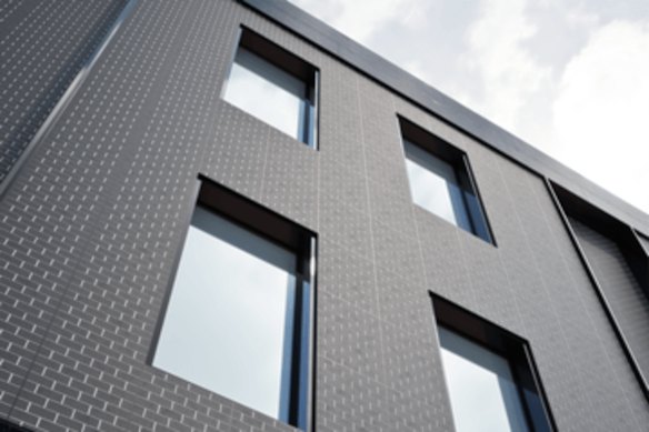 ClearVue Technology’s transparent power-generating solar windows installed into an external wall clad with the company’s power-generating façade.