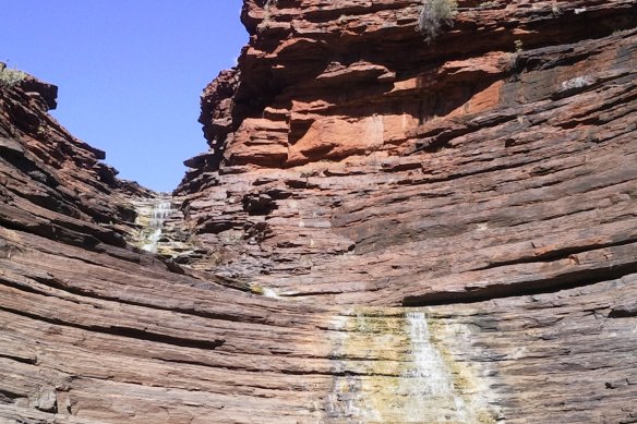 Banded iron formations commonly found in the Pilbara region of WA provide high-grade iron ore to China and other steel-producing nations.