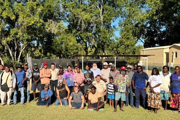 Beetaloo Energy managing director Alex Underwood (front centre) poses with Traditional Owners after the local community gave the company crucial consent for gas sales from its Northern Territory Carpentaria pilot project