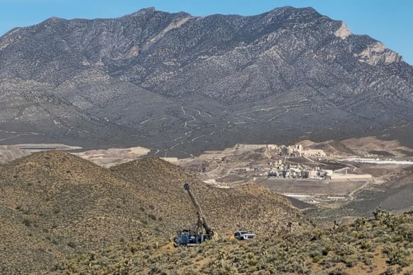 Diamond drilling on site at Locksley Resources El Campo project in California, with the world-class Mountain Pass rare earths mine in the background.