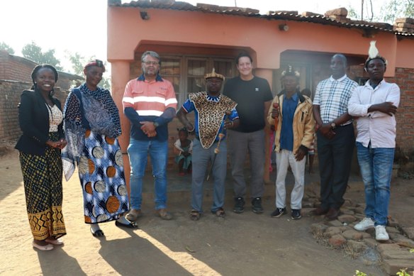 Lindian Resources’ construction manager Daniel Britz and community liaison officer Rebecca Hami meet the area chief and community leaders. Lindian says community engagement has de-risked its early site works.