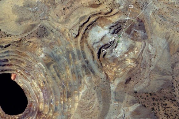 An overhead picture of Dateline Mining’s Colosseum mine in California, showing the recent drill orientation in the North Pit and the water-filled South Pit.