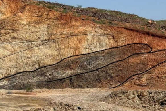 Anax Metals’ Mons Cupri Northwest open pit showing chlorite-altered ore host thrust onto younger unaltered rhyolite.