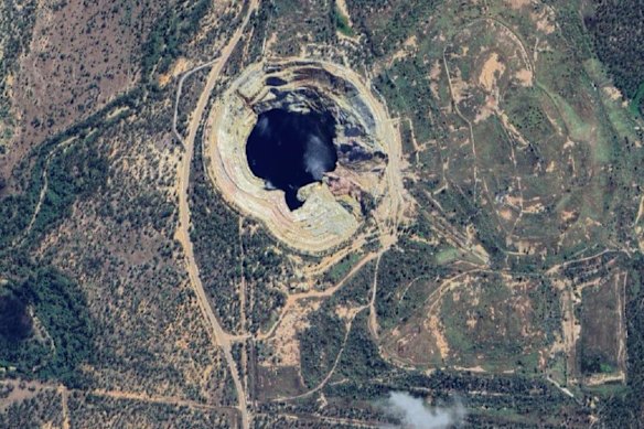 A bird’s eye view of the historic high-grade pit at Loyal Metal’s Highway Reward copper-gold project, where a highway was literally diverted to unlock its riches. 
