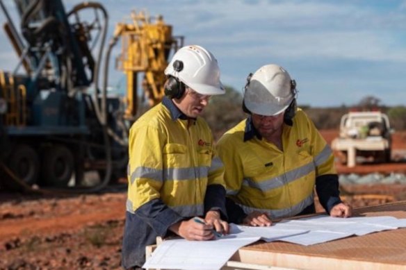 Geologists analysing Gateway Mining’s aircore drilling data at its Mustang prospect, part of the company’s Yandal gold project near Wiluna in Western Australia.