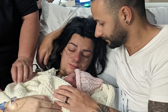 The Iskanders and Mia in hospital after the delivery.