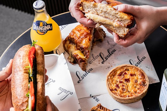 Get a baguette sandwich, a salad and a bottle of Orangina for $15 at Petit Loulou.