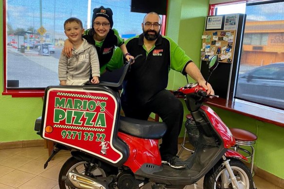 Mario’s Pizza in Dianella has shut over Perth’s latest coronavirus case because of the high risk to his family and community. Mario Franchina with daughter Aaliyah (9), son Rocky (4).
