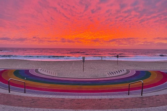 Sunrise at Coogee Beach’s Rainbow Flag amphitheatre.