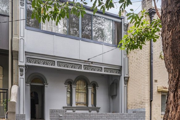 A Victorian terrace in Redfern, operating as a boarding house, passed in at auction. 