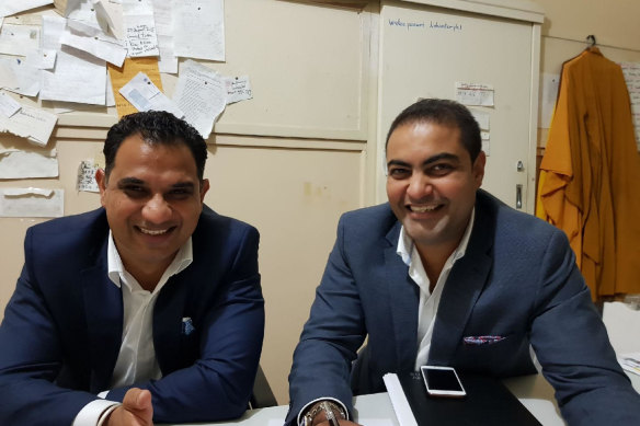 PSP Property Group agents Ramdeep Sidhu (left) and Randeep Dhaliwal inside the office of the then president of the Melbourne Linh Son Buddhist Society, Master Dao.