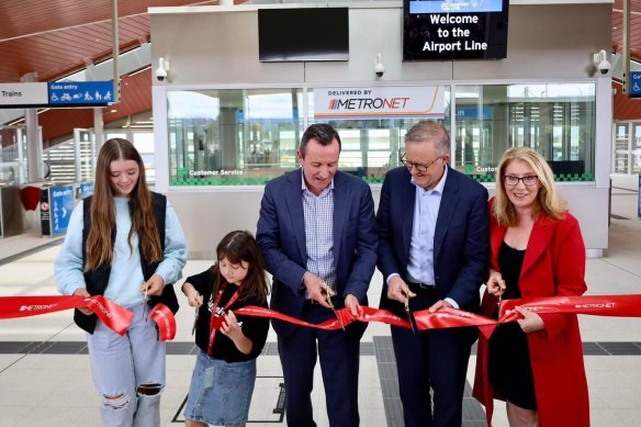 Premier Mark McGowan (centre), PM Anthony Albanese and WA Transport Minister Rita Saffioti cut the ribbon at the opening of Perth’s Metronet Airport Link on Sunday.