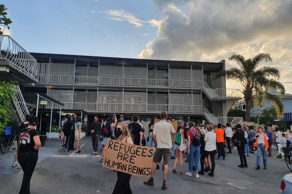 Protesters inside the grounds of the now empty Kangaroo Point hotel on Friday.