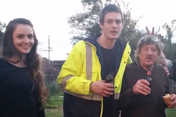 Steven Woodhouse (centre) with his sister Shaye and his father.
