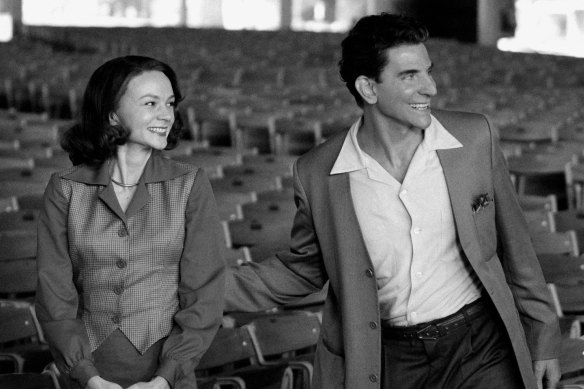Carey Mulligan as Felicia Montealegre and Bradley Cooper as Leonard Bernstein in Maestro.