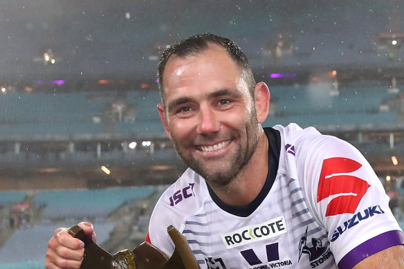 Cameron Smith poses with the NRL premiership trophy after last year’s triumph over Penrith.