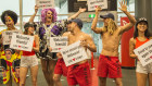 Lifeguards and drag queens greeted the flights from Victoria. 