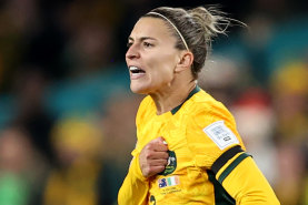 Steph Catley celebrates after scoring the first goal for Australia at the World Cup against Ireland.