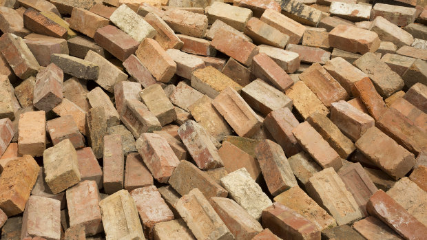 A battle has broken out between two billionaire families over the brick market.  