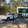 A woman in her 50s and one of her pet dogs have died, after the car she was driving crashed into a bus in Perth’s north on Monday morning.