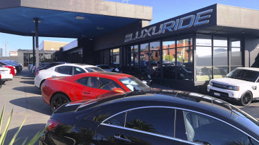 Luxury Perth car dealership, director fined $100,000 as burnt customers
