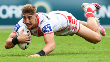 dragons nrl win titans helped lomax zac try eventually hapless grind lead straight half second go they over