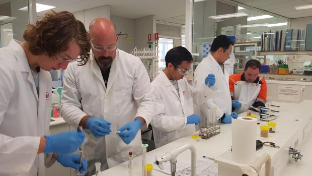 Pilbara Minerals staff undertaking the new lithium specific qualification.